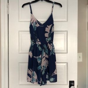 Floral/tropical navy cross back romper - size M